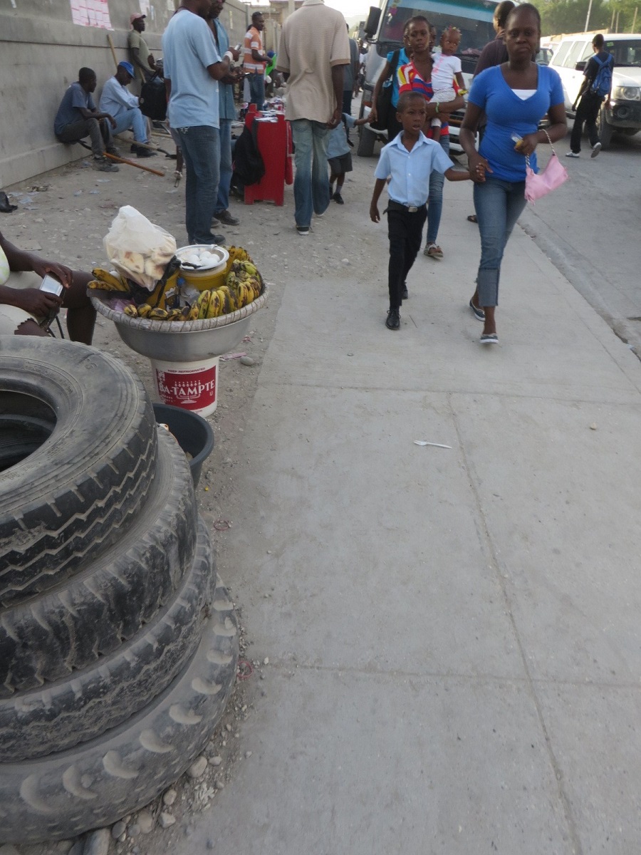 parent walking their child to school