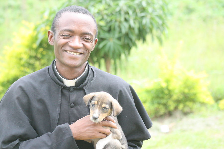 Fr. JohnBosco recently adopted a puppy, Polo, who was found outside of the CARITAS For Children Learning Center