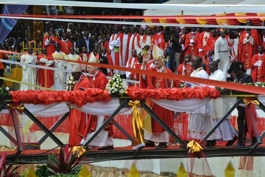 This image and those that follow in this post were taken by CARITAS interns, Amber and Emily, while they joined thousands of people at the Namugongo Shrines on June 3, 2014. In this photograph, local and international Catholic bishops and priests gather to celebrate Mass.