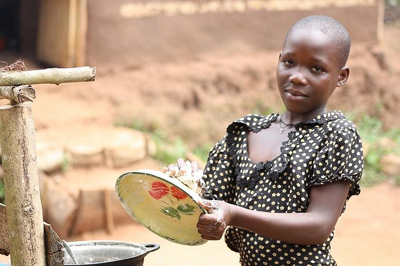 Cleire washing dishes