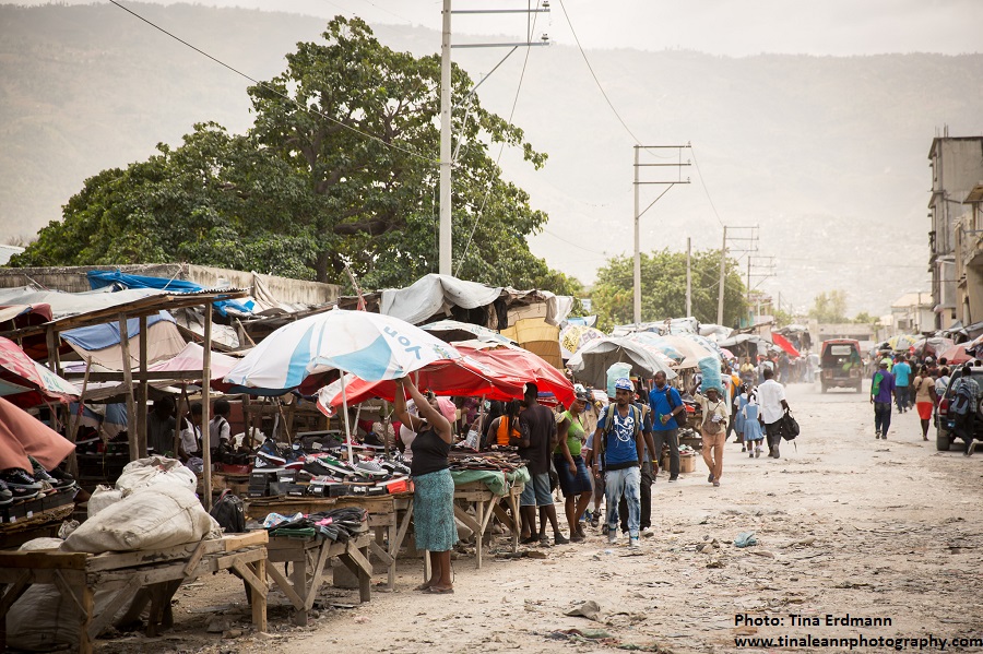 Street vendors under sun umbrellas on the streets of Port au Prince, Haiti