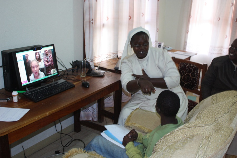 Blessing and Sr. Angeline,one of the directors at Providence Home, skyping with the student sponsors from the International American School.
