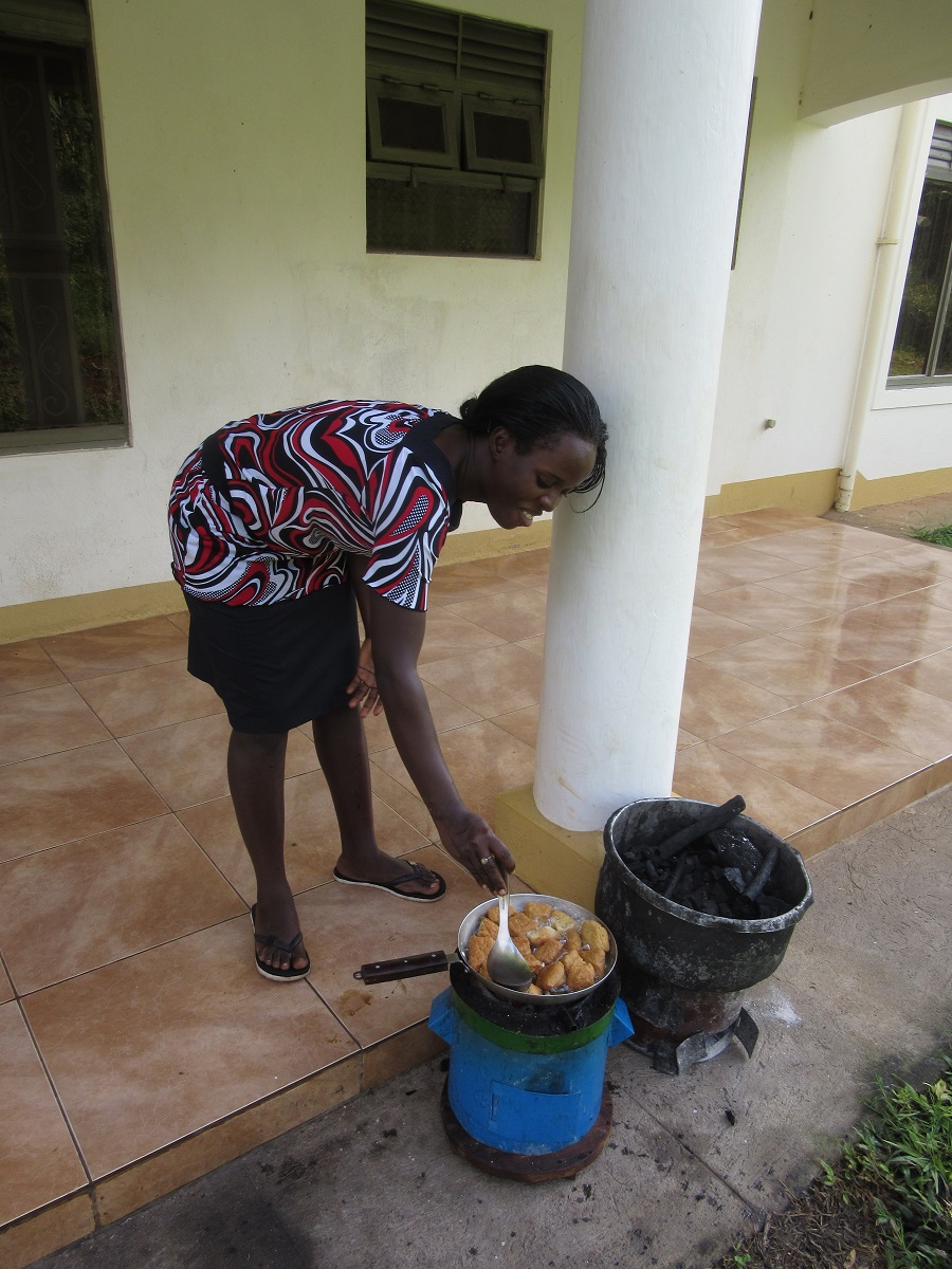 Teddy frying the Mandazi