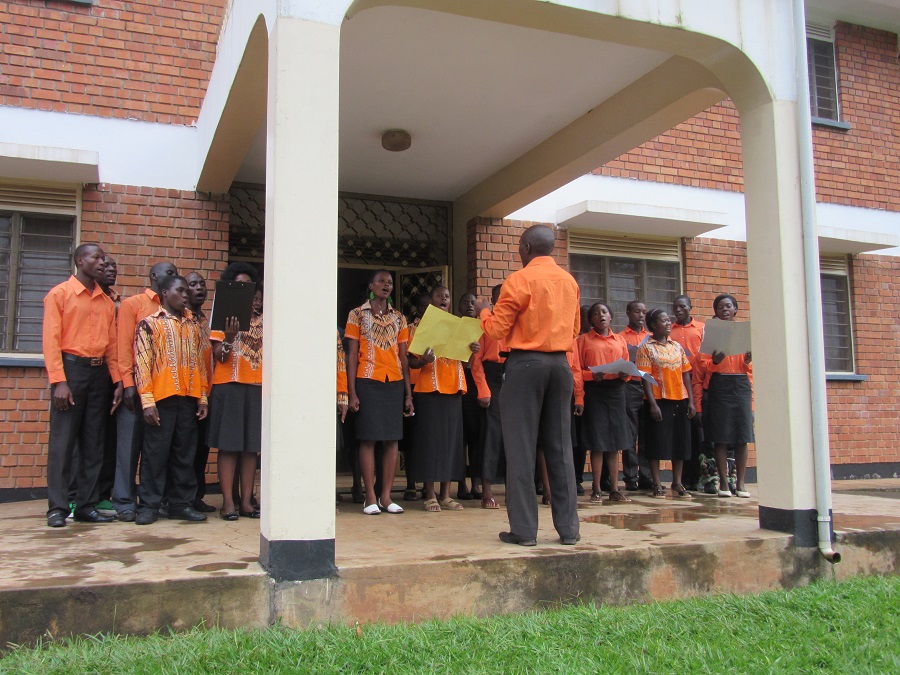 The Nkokonjeru Choir singing on the veranda. Most of the songs were in Luganda, although a few English hymns were included. 