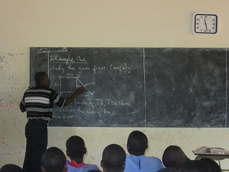 During his vacations from the seminary -classes begin again in September - Frank has been volunteering at local schools and and helping out around the CARITAS office. Twice a week, Frank teaches mathematics to the P7 class at St. Paul