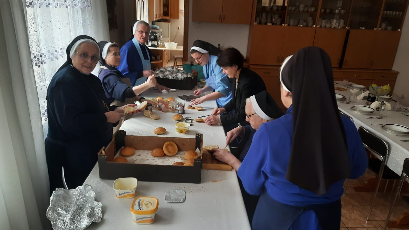 Sisters Making Food for Refugees